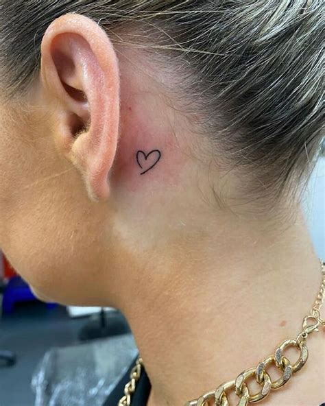 broken heart tattoo behind ear|Heart Tattoo Ideas for Behind the Ear